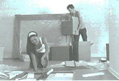 A couple moving into a house